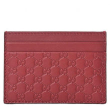 Load image into Gallery viewer, Gucci card holder.  Six card slots and a middle slot.  Bright Red color makes this card holder easy to find in a side pocket.  It is slim enough to carry in a back pocket.  Carry all of your essentials in style.