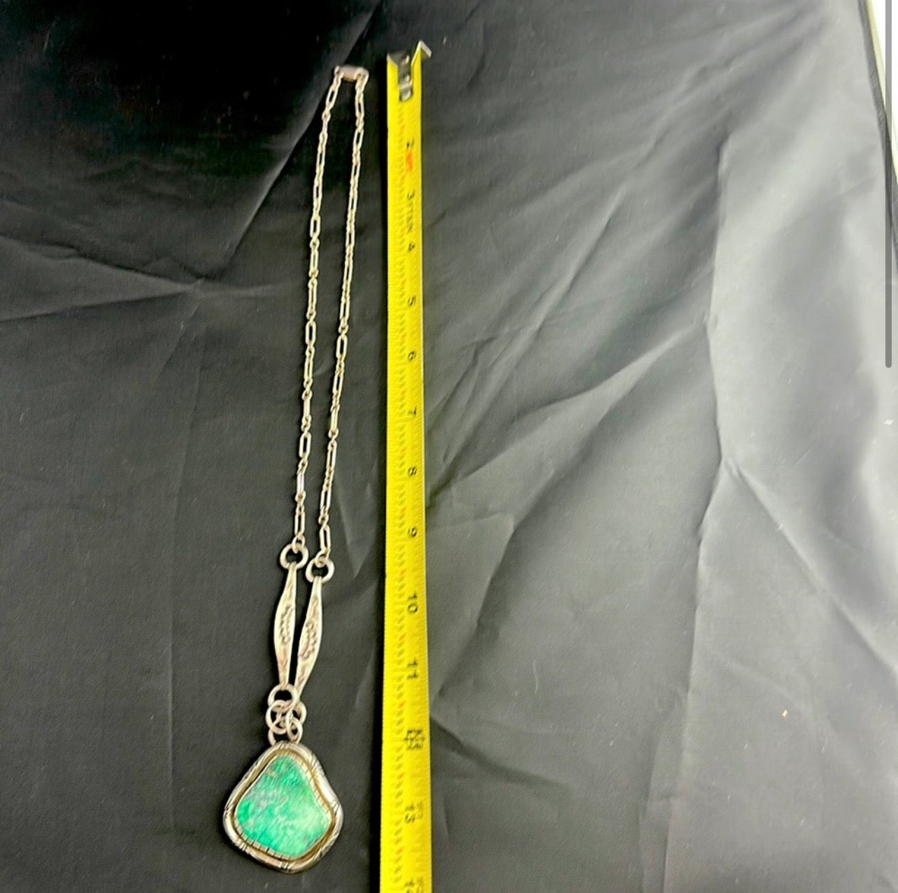 Sterling Silver and real turquoise artist stamped necklace.
Statement piece