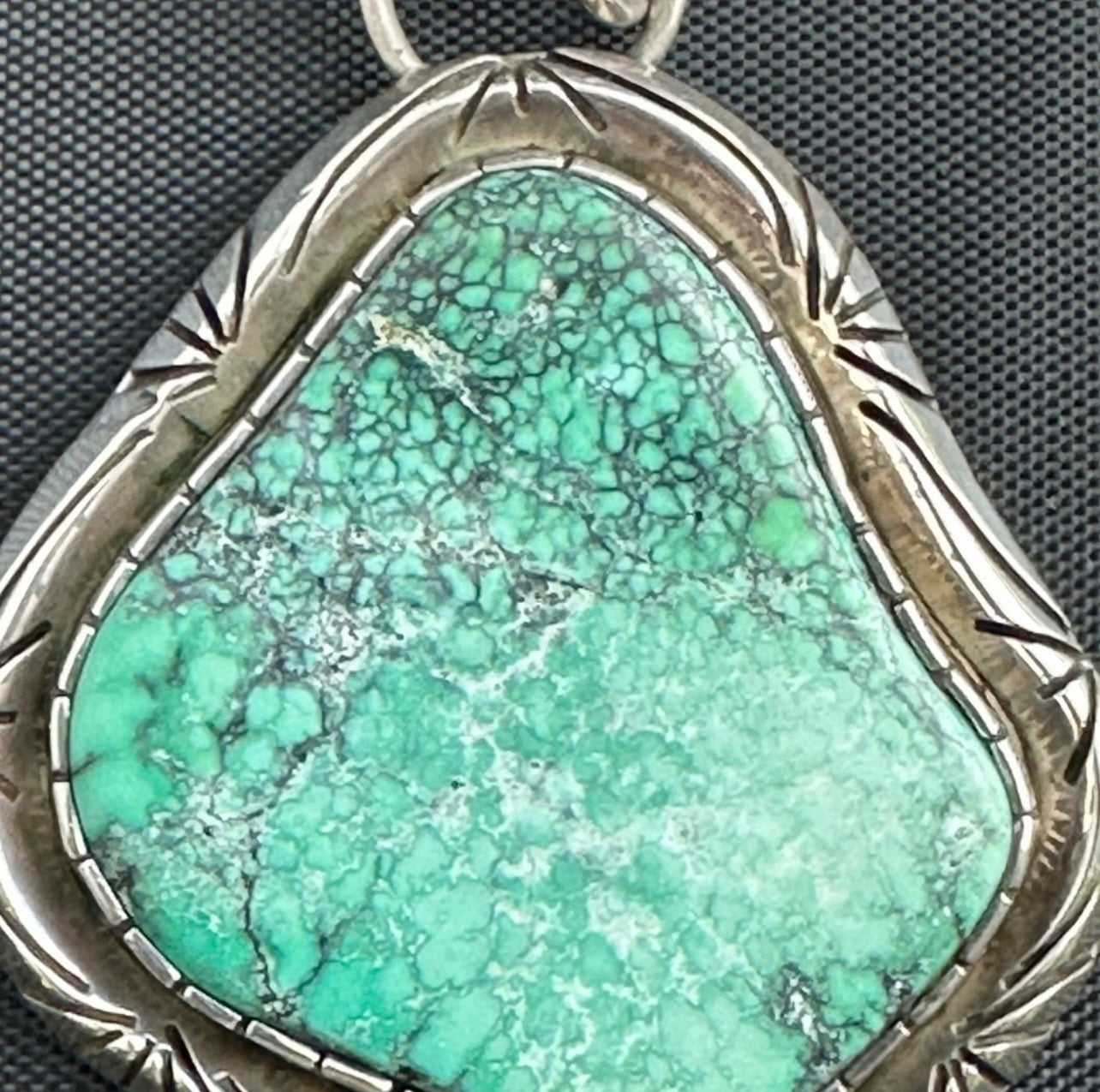 Sterling Silver and real turquoise artist stamped necklace.
Statement piece