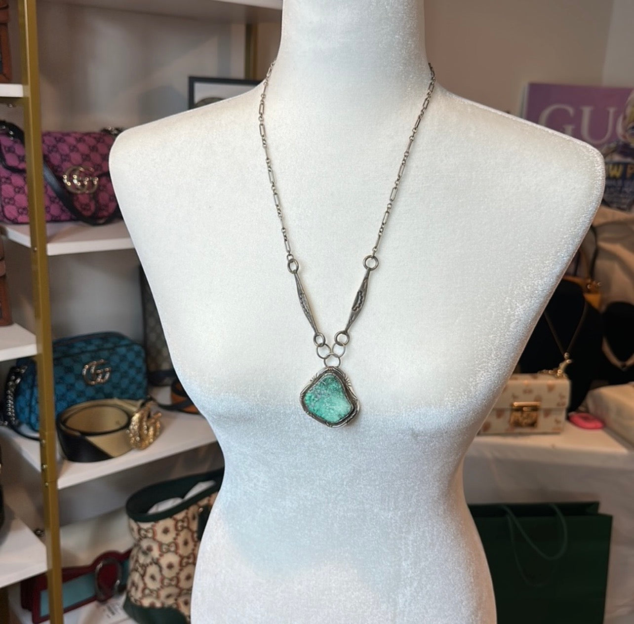 Sterling Silver and real turquoise artist stamped necklace.
Statement piece