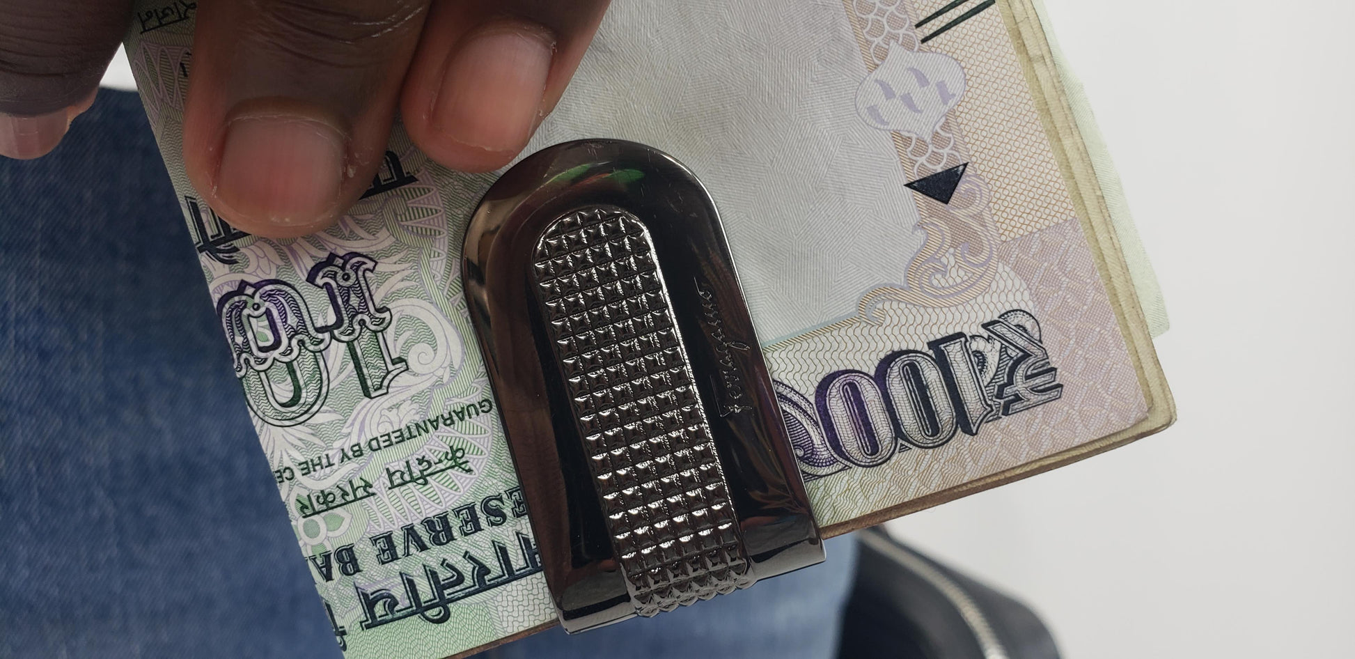 Gun Metal money clip Made with silver-toned metals 1.75" x 1" x 0.25" Comes in red velvet Ferragamo dust bag Product number 698115 Made in Italy