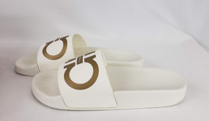 These slides are hard to come by and we can definitely see why! In a beautiful creamy white with gold accents, these shoes are the epitome of pool side footwear. With the double Gancini design, they are recognizably Ferragamo. The materials used are high quality rubber to keep you comfortable and stylish as you lounge in the summer time!