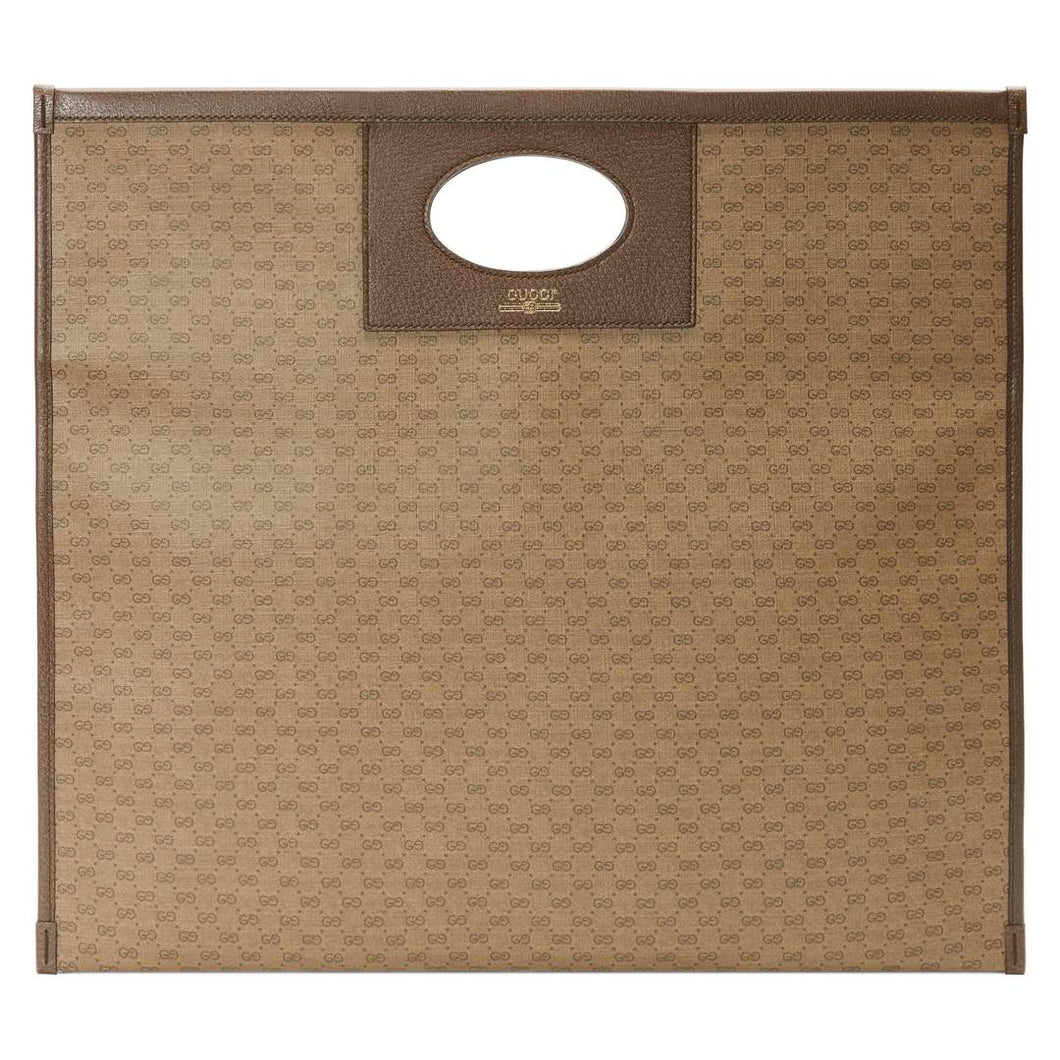 The Gucci Mini GG Supreme Print Canvas Tote in Beige is a large tote bag crafted of beige canvas and brown leather. A take on the signature pattern, this mini interlocking GG print has a vintage feel. This bag features a cut out style handle, Gucci name and logo stripe in gold and a canvas interior lining. 