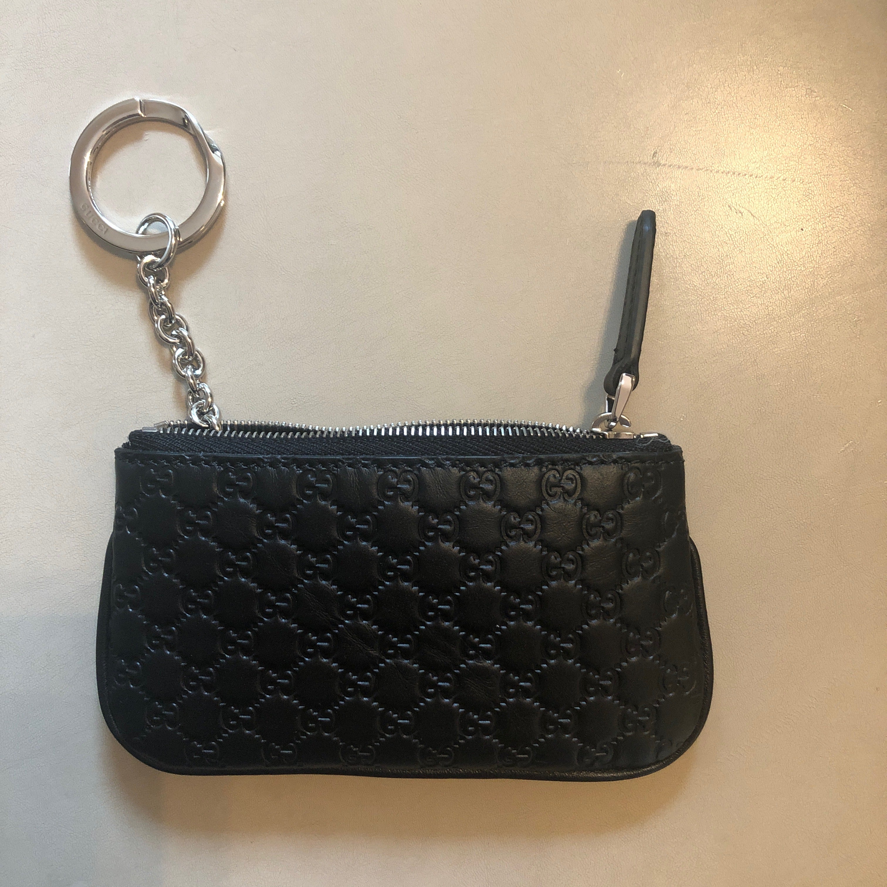 My easy pouch came! I compared it to the Gucci super mini & the Mini PA. It  fit my Rosalie coin purse, 6 key ring, and a lip oil in it. You