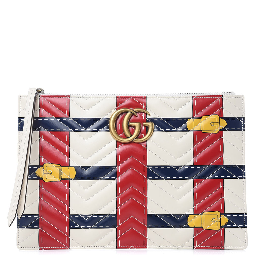 The Gucci Matelasse Trompe L'Oeil Print GG Marmont Pouch in White is crafted of lovely textured calfskin leather in black. This bag features chevron stitching, an aged gold interlocking GG logo and a beige fabric interior. The pattern is designed into woven navy and red stripes with print buckles. The term 