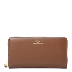 Gucci Zip Around Leather Wallet with Metallic Logo in Brown