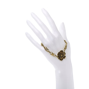 Gucci Metal Floral Bracelet in Aged Gold