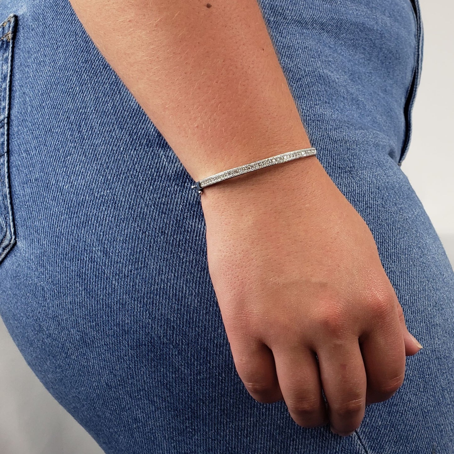 Silver cuff bracelet  1 Carat Weight (203 Natural Diamonds) 14K White Gold Bracelet Diamond encrusted on the top Safety hinge and snap clasp Medium size band International Gemological Information Evaluation Report Included