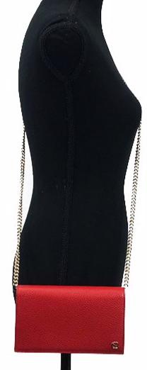 This chic wallet on chain is crafted of textured calfskin leather. The shoulder bag features a shoulder chain and a small Gucci GG emblem. It opens to a matte leather interior with a spacious zippered currency compartment, and card slot panels. This is an ideal chain wallet for keeping contents close at hand, by Gucci! The chain is removable so you can carry this bag as a wallet or wear is as a cross body.