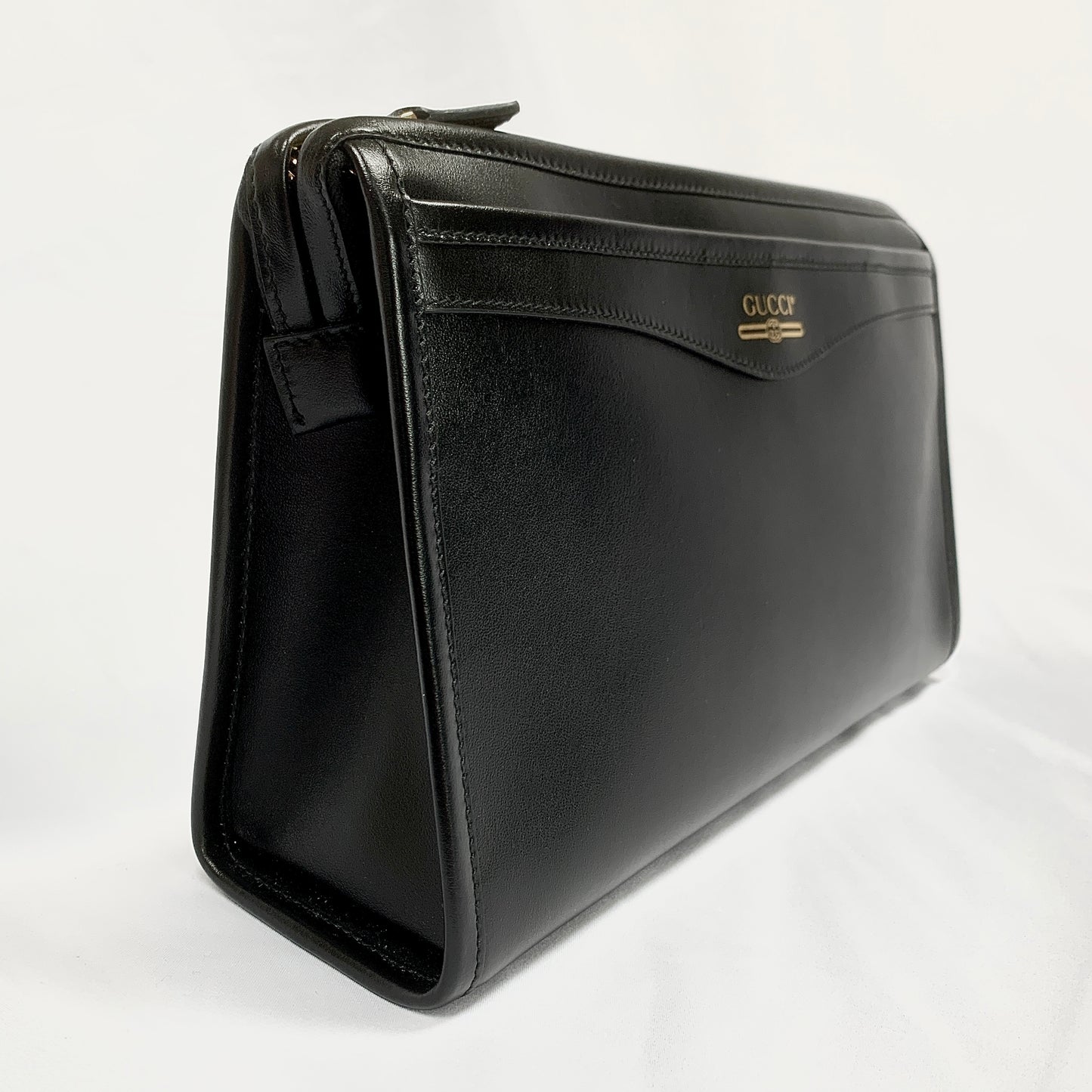 Gucci Metallic Print Logo Smooth Leather Clutch in Black