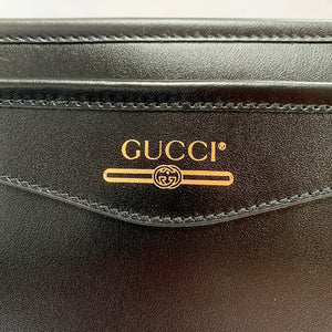 Gucci Metallic Print Logo Smooth Leather Clutch in Black