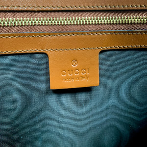 Gucci Metallic Print Logo Smooth Leather Clutch in Brown