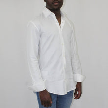 Load image into Gallery viewer, A white Button down shirt is a staple in every man&#39;s closet, so why not treat yourself to a little luxury? This Ferragamo shirt is a classic white in a smooth cotton material with the signature GG pattern. This shirt has sharp pointed color and cuffs secured with a simple button, making it a must have in your closet. Whether you wear it tucked into a pair of dress pants, under a sport coat, or with a nice pair of jeans, this shirt is versatile and will leave you looking your best at all times!
