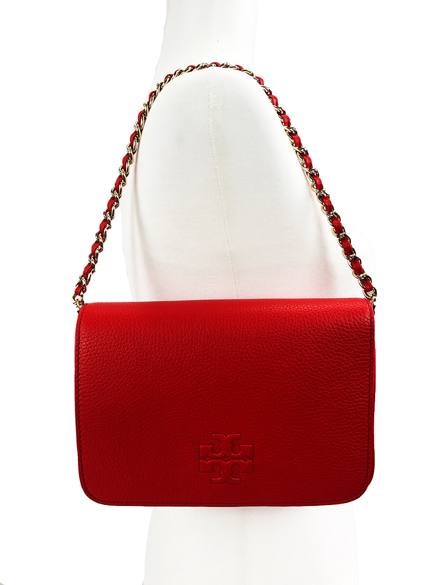 Magnetic-snap flap closure. Zip pocket under flap. Interior wall and smartphone pockets. Exterior slip pocket with magnetic snap closure. 10 ¾"W x 7"H x 1 ¼"D. 7" strap drop; 22" - 24" crossbody strap drop.