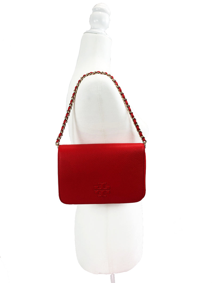 Magnetic-snap flap closure. Zip pocket under flap. Interior wall and smartphone pockets. Exterior slip pocket with magnetic snap closure. 10 ¾"W x 7"H x 1 ¼"D. 7" strap drop; 22" - 24" crossbody strap drop.