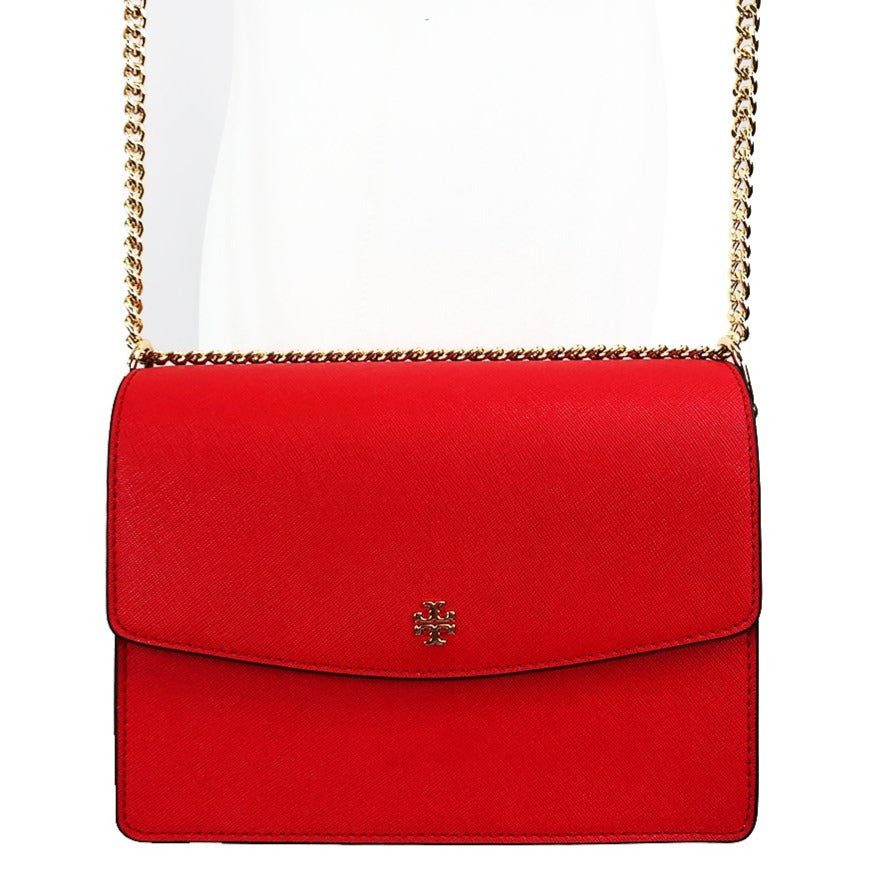 Tory Burch's adjustable shoulder bag is the most versatile handbag in this collection! Able to be worn as a crossbody and a shoulder bag, it works well with every occasion. Shoulder strap 12-21.5" drop Dimensions: 8.5" W x 4" D x 6.5" H Strap can be worn doubled up Magnetic snap closure Two interior compartments 1 Interior Pocket