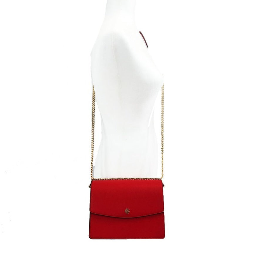 Tory Burch's adjustable shoulder bag is the most versatile handbag in this collection! Able to be worn as a crossbody and a shoulder bag, it works well with every occasion. Shoulder strap 12-21.5" drop Dimensions: 8.5" W x 4" D x 6.5" H Strap can be worn doubled up Magnetic snap closure Two interior compartments 1 Interior Pocket