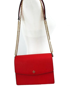 Tory Burch's adjustable shoulder bag is the most versatile handbag in this collection! Able to be worn as a crossbody and a shoulder bag, it works well with every occasion. Shoulder strap 12-21.5" drop Dimensions: 8.5" W x 4" D x 6.5" H Strap can be worn doubled up Magnetic snap closure Two interior compartments 1 Interior Pocket