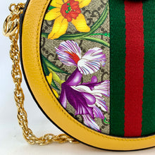 Load image into Gallery viewer, Yellow Ophidia GG Flora round crossbody bag Flora patterned body Beige interior lining  Gold-toned hardware  GG Supreme canvas Leather trim, accents, and strap Signature Gucci web GG logo accent at top and small charm 7.5&quot; x 7.5&quot; x 1.75&quot; Strap drop 22.75&quot; Product number 550618 Made in Italy 