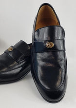 Load image into Gallery viewer, Supple black leather is carefully stitched to perfection in these Gucci Mens Loomis loafers. These fashionable shoes are made with the finest materials and dawn the signature Gucci logo. With an elongated toe, leather lining, and leather outsole, these shoes form to your foot for the upmost comfort and style.  Shoes come with Dustbag, Box, and Shoe Horn
