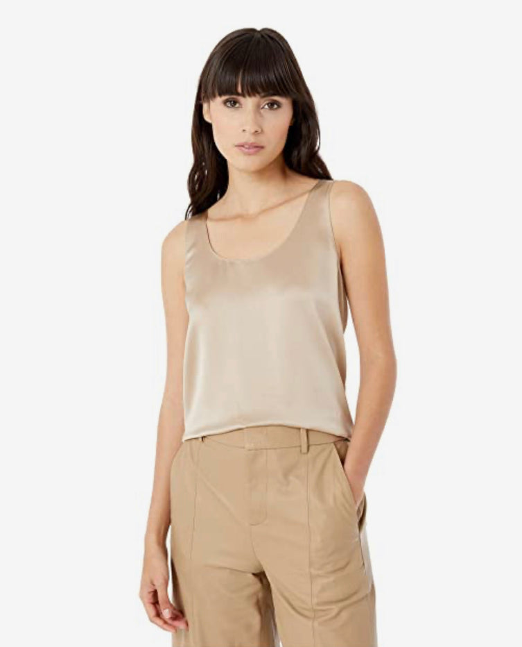 Vince Satin Tank in Sandollar with a u neck line is a champagne toned silky top with a rich sheen.  A perfect neutral tone, this tank top goes with any outfit.  Wear alone or layer for cooler days and nights.  satin  sits at waist  Sandollar