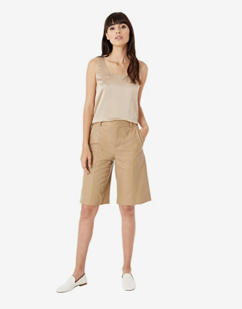 Vince Satin Tank in Sandollar with a u neck line is a champagne toned silky top with a rich sheen.  A perfect neutral tone, this tank top goes with any outfit.  Wear alone or layer for cooler days and nights.  satin  sits at waist  Sandollar