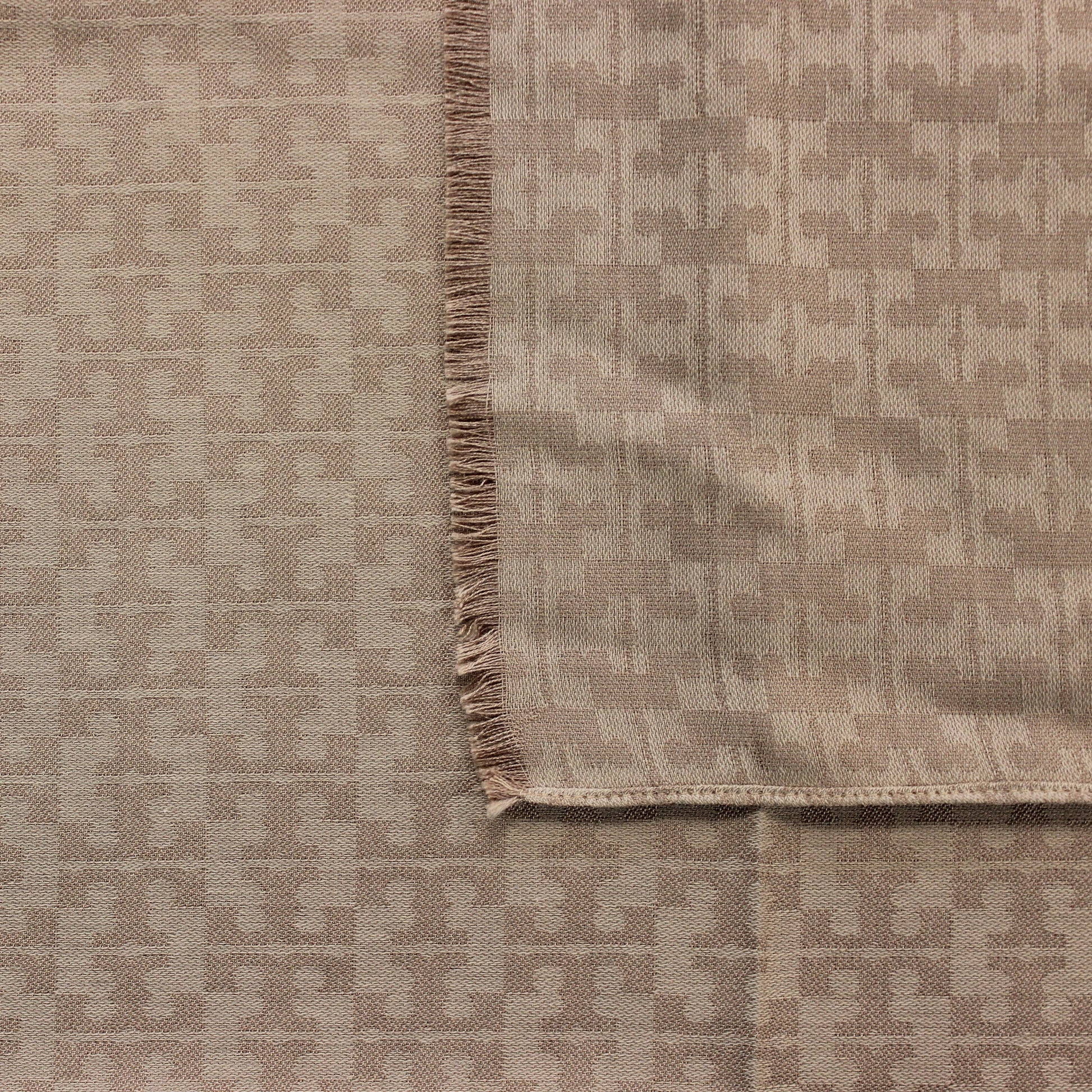 Light Oak with a Tory Burch logo pattern Eyelash fringe on edges 50% Cotton, 50% Silk 77" x 51" (195.5cm x 129.5cm) Product Code 1900417076518 Made in France