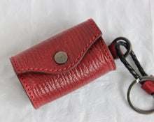 Load image into Gallery viewer, Red doggie bag holder Silver-toned hardware featuring Ferragamo logo 100% leather Snap closure Round and clip style key rings  3&quot; x 1.5&quot; x 1.75&quot; Key chain strap 3&quot; Product number 660868 Made in Italy