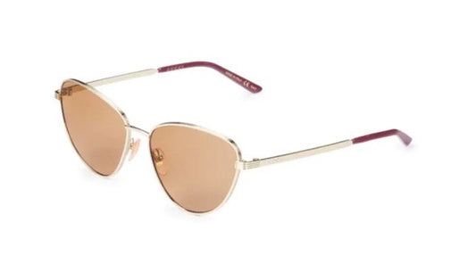 Gucci Cat Eye Sunglasses in Gold