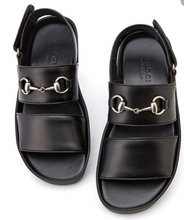 Load image into Gallery viewer, Black Greek Sandals  Silver-toned hardware featuring enameled interlocking G horsebit Chrome-free tanned leather Leather sole Adjustable buckle closure 1.7&quot; heel height Product number 473501 Made in Italy