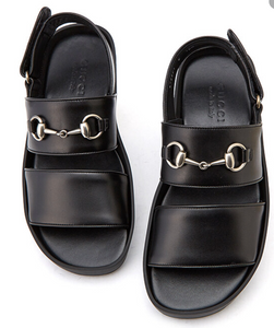 Black Greek Sandals  Silver-toned hardware featuring enameled interlocking G horsebit Chrome-free tanned leather Leather sole Adjustable buckle closure 1.7" heel height Product number 473501 Made in Italy