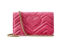 Load image into Gallery viewer, The Gucci Marmont Velvet Love Mini Shoulder Bag in Pink is velvety and gorgeous. Spelled out in imitation pearls and surrounded by sparkling beads, the word &quot;love&quot; is flanked by flowers and set against plush pink velvet on this quilted shoulder bag. GG hardware in a warm golden tone, a silk-lined interior and a heart stitched at the back complete the stunning style.