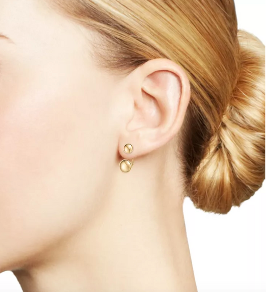 100% 14K Yellow Gold ball earrings with adjustable ear jacket.  Create a double layered look with adjustable ear jacket to fit any size ear lobe.  Dual polished gold balls hang elegantly as a stud and just under your ear, connected in the back for an invisible drop 