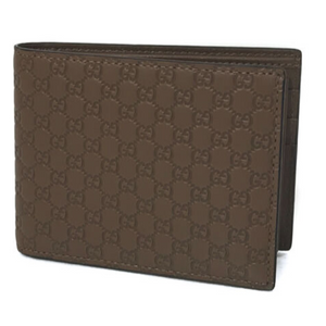 Gucci camel color leather bifold men’s wallet. Perfect size for your everyday needs. It boasts the beautiful GG embossed finish for a timeless style that you'll love year after year. With six credit card slots, one coin pocket, and one bill compartment, all of your cards, cash, and coins can be easily accessed and stored. Make this Gucci piece your go-to wallet!