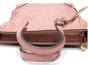 This Gucci GG Logo Microguccissima pink handbag is so cute and perfect for everyday. In a versitile design that effortlessly transitions from handbag to shoulder bag, this accessory can follow you in any situation! The interior is lined in soft, durable linen and includes 2 slip pockets and 1 zipped pocket to keep you organized all day long. Complete with a cute Gucci charm and leather tassel, this bag has all the class you need to style any outfit!