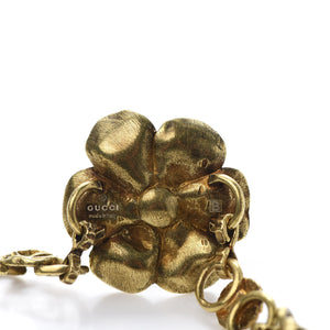 Gucci Metal Floral Bracelet in Aged Gold