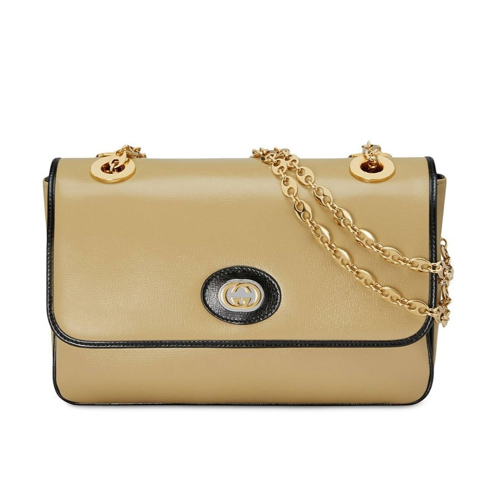 Yellow GG Motif Marina Shoulder Bag Black trim and interior  Gold-tone hardware  100% calfskin leather  Top flap with magnetic closure  2 main compartments  1 zipped pouch  7" x 10" x 2" Product number 5764211 Made in Italy 