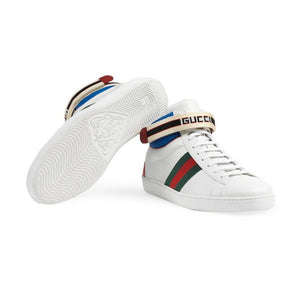 White stripe ace high-top sneakers Blue trim with red and green detailing  100% leather  Nylon trim  Lace up style Velcro red and black Gucci Jacquard strap Signature Gucci web Snake ayer accent on backs Rubber sole with knight  Product number 5234720 Made in Italy 