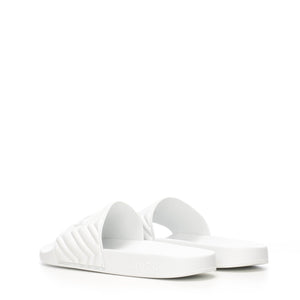 Gucci Matelassé Rubber Slides In White