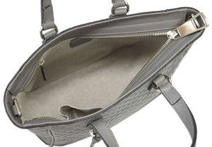 Graphite gray crossbody tote bag Gold-tone hardware featuring Gucci charm 100% leather in GG Microguccissima pattern Linen interior lining Top zip closure Detachable and adjustable shoulder strap 2 slip pouches, 1 zipped pocket Leather tassel detail 8.5" x 11.5" x 4.5"  Strap Drop 19-21 Handle drop 3.5" Product number 449241 Made in Italy 