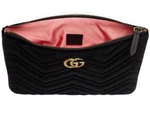 The Gucci Marmont Matelesse Velvet Zip Pouch is plush velvet textured with exquisite matelasse stitching enhances the statement-making style of a trim zip-top pouch that can double as a chic clutch. Gilded GG hardware inspired by an archival design adds a signature finishing touch.