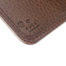 Load image into Gallery viewer, Brown and Beige wallet Signature interlocking GG pattern Light gold-toned hardware GG Supreme canvas lined with leather Zip around closure Money flap secured with snap button 6 credit card slots, 1 zipped coin pouch, 1 bill compartment 4&quot; x 4.25&quot; x 1.25&quot; Product number 346056 Made in Italy