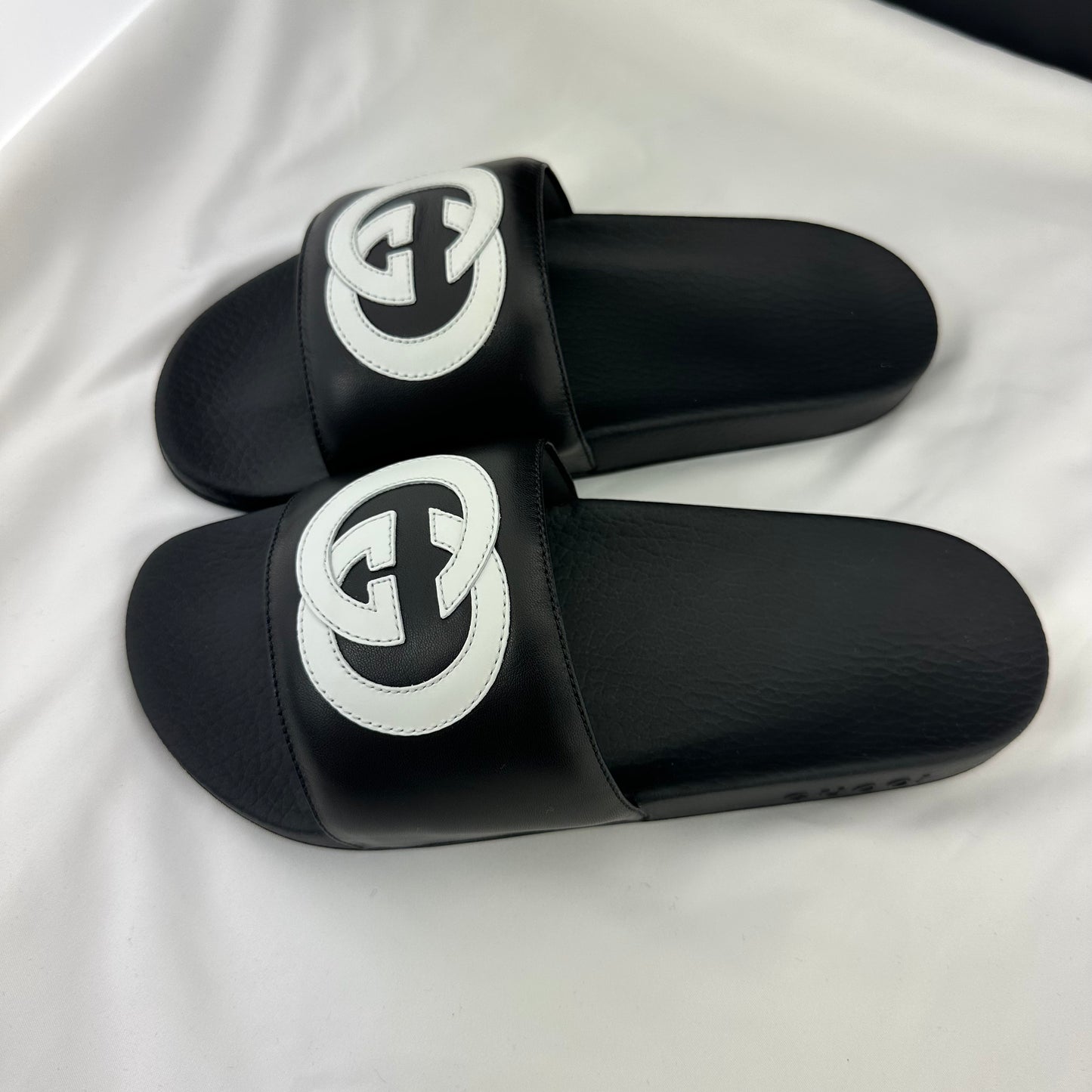 Gucci Men's Black Slides with White Interlocking GG