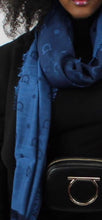Load image into Gallery viewer, Keep warm and stay looking stylish in this scarf good for the winter or even as a shawl in warmer months.  Denim blue shades make it perfect for folding inside your bag to wear with jeans or something dressy.  Perfect for those air conditioned indoors and cool spring and summer nights.  Gancini Blue Libellula 60% Virgin wool, 28% Cashmere, 12% Silk 80&quot; x 27&quot; (203cm x 68.5cm) Comes in Ferragamo scarf box Product Code 525000 Made in Italy