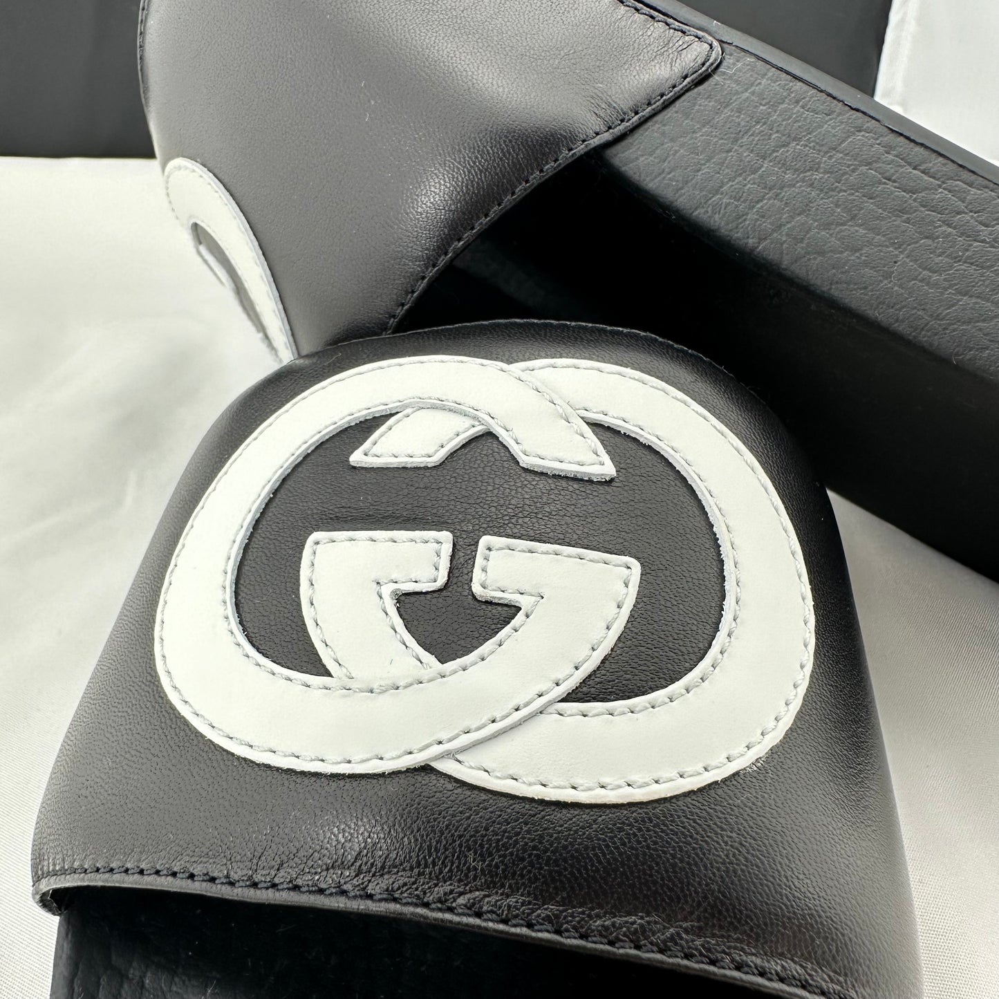Gucci Women's Black Slides with White Interlocking GG