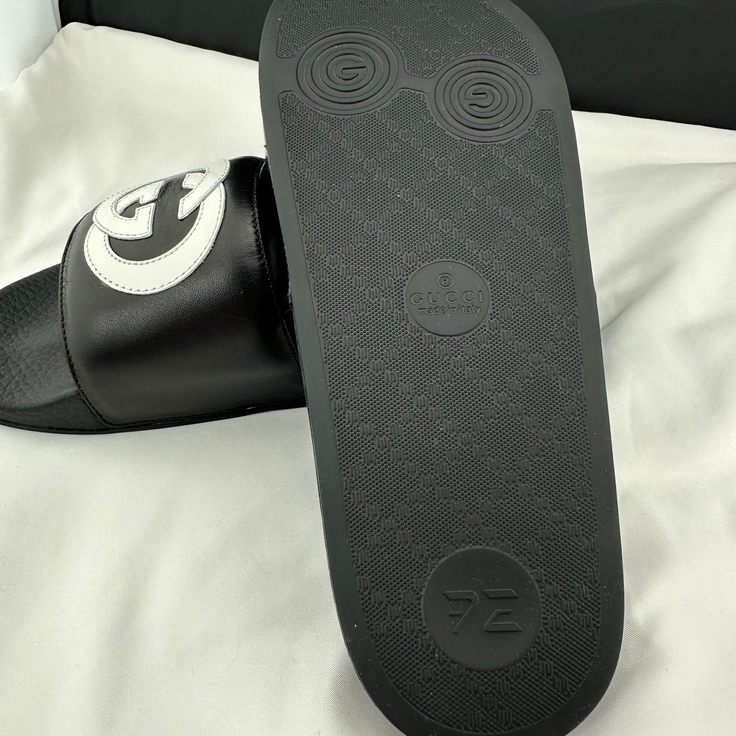 Gucci Men's Black Slides with White Interlocking GG