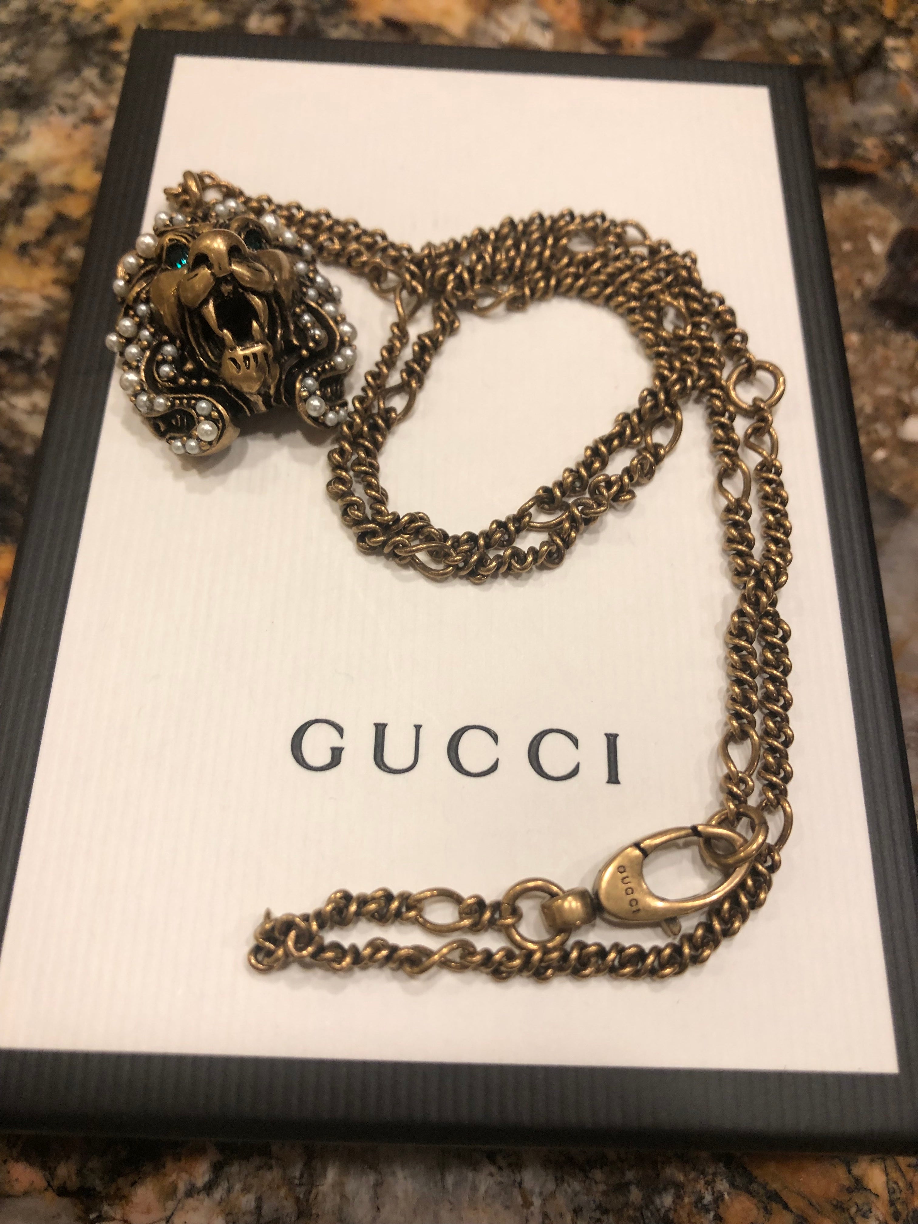 Gucci necklace with lion head pendant Cost £650