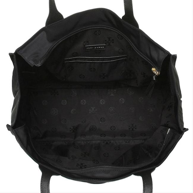  In addition to a large, spacious interior, 2 snap closures are placed on either side of the bag to extend space further and accommodate for busier days. Whether its heading off to work or into the city, we know you'll love bringing this gorgeous tote everywhere you go!