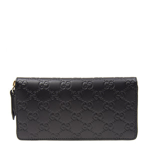 Gucci Interlocking GG Embossed Leather Zip Around Wallet in Black