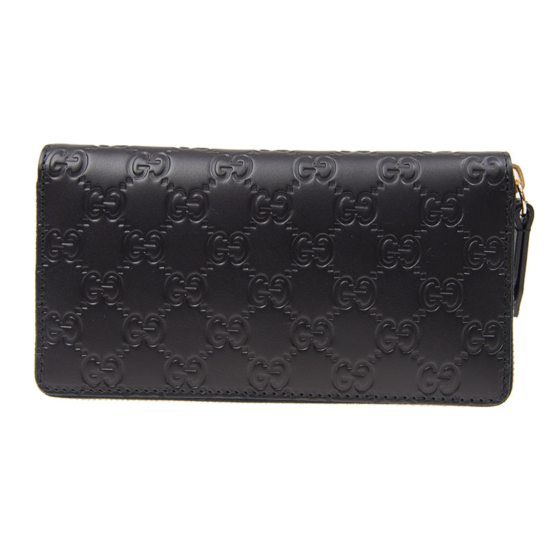 Gucci Interlocking GG Embossed Leather Zip Around Wallet in Black